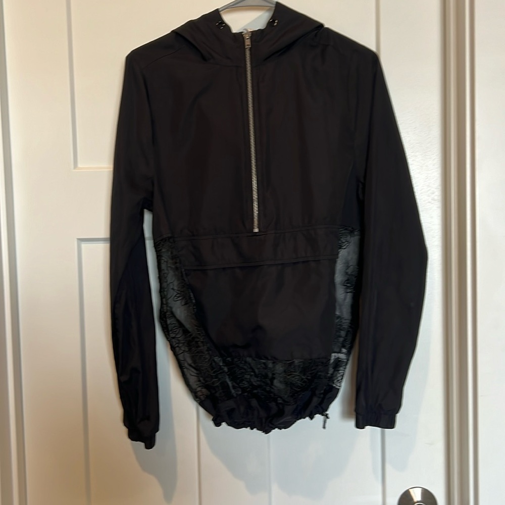 Fabletics styled light weight jacket. 3/4 zip.
